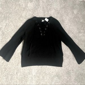 Black boutique bell arm tie up sweater